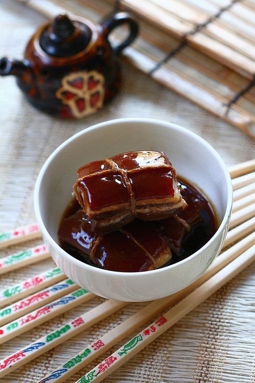 Easy homemade Chinese braised pork belly in brown thick gravy served in a bowl.