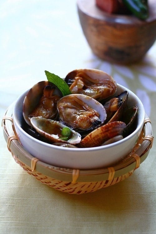 Easy and delicious Chinese Kam Heong sitr fry clams served in a bowl.