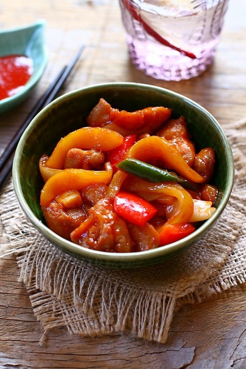 Tasty homemade mango chicken stir fry in orange sauce, ready to serve.