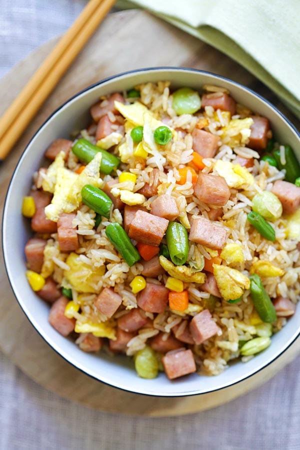 Easy and quick fried rice with ham served in a bowl.