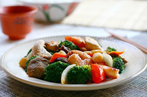 American-Chinese dish with seafood, meat, and vegetables cooked in brown sauce.