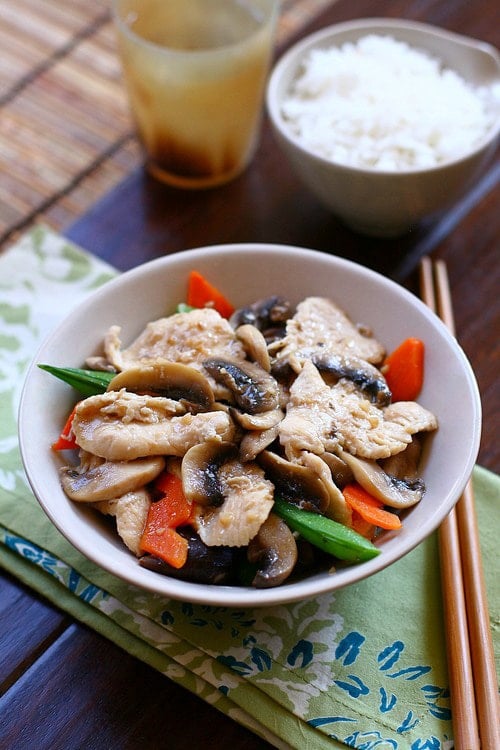 Easy Moo Goo Gai Pan recipe with chicken, mushroom and veggies in a bowl.