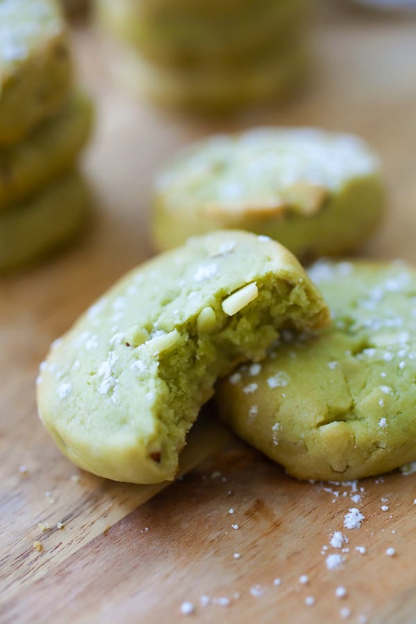 Matcha butter cookies with almond with a bite.