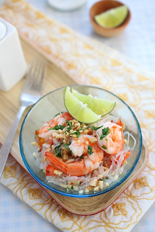 Easy and healthy homemade Thai noodle salad yum woon sen with shrimps served in a bowl.