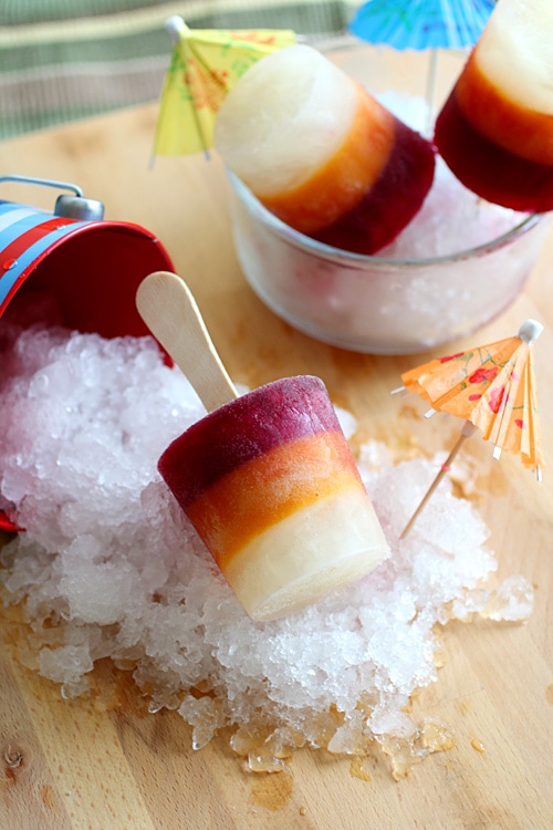 Delicious and refreshing longan, mango and pomegranate popsicles.