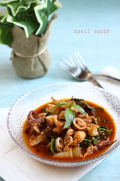 Easy and delicious skillet Thai basil squid served in a bowl.