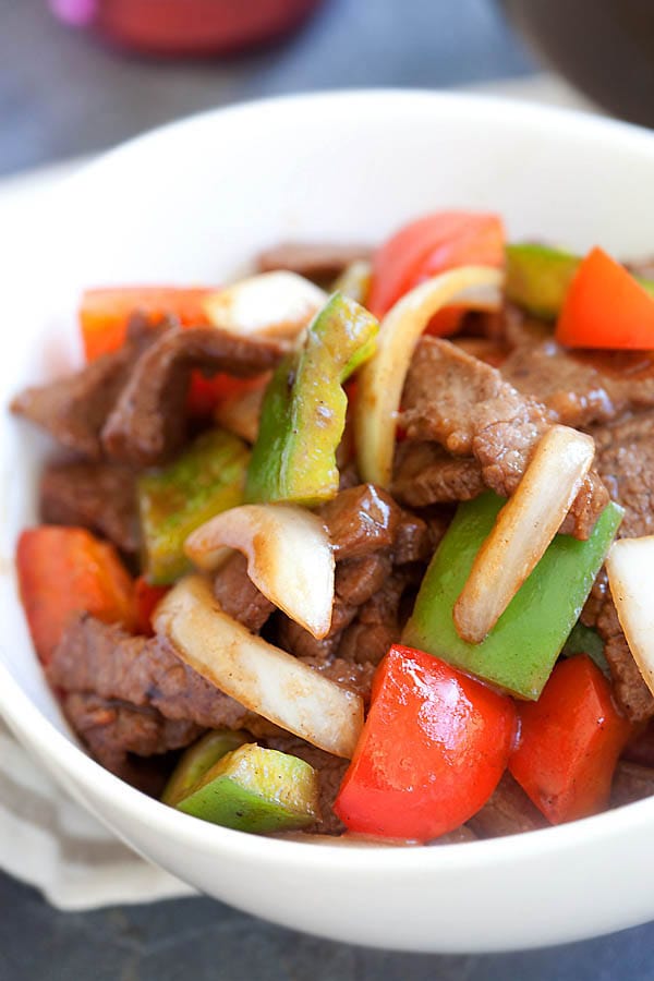 Easy homemade stir fry black pepper beef with beef, black pepper and onion served in a bowl.