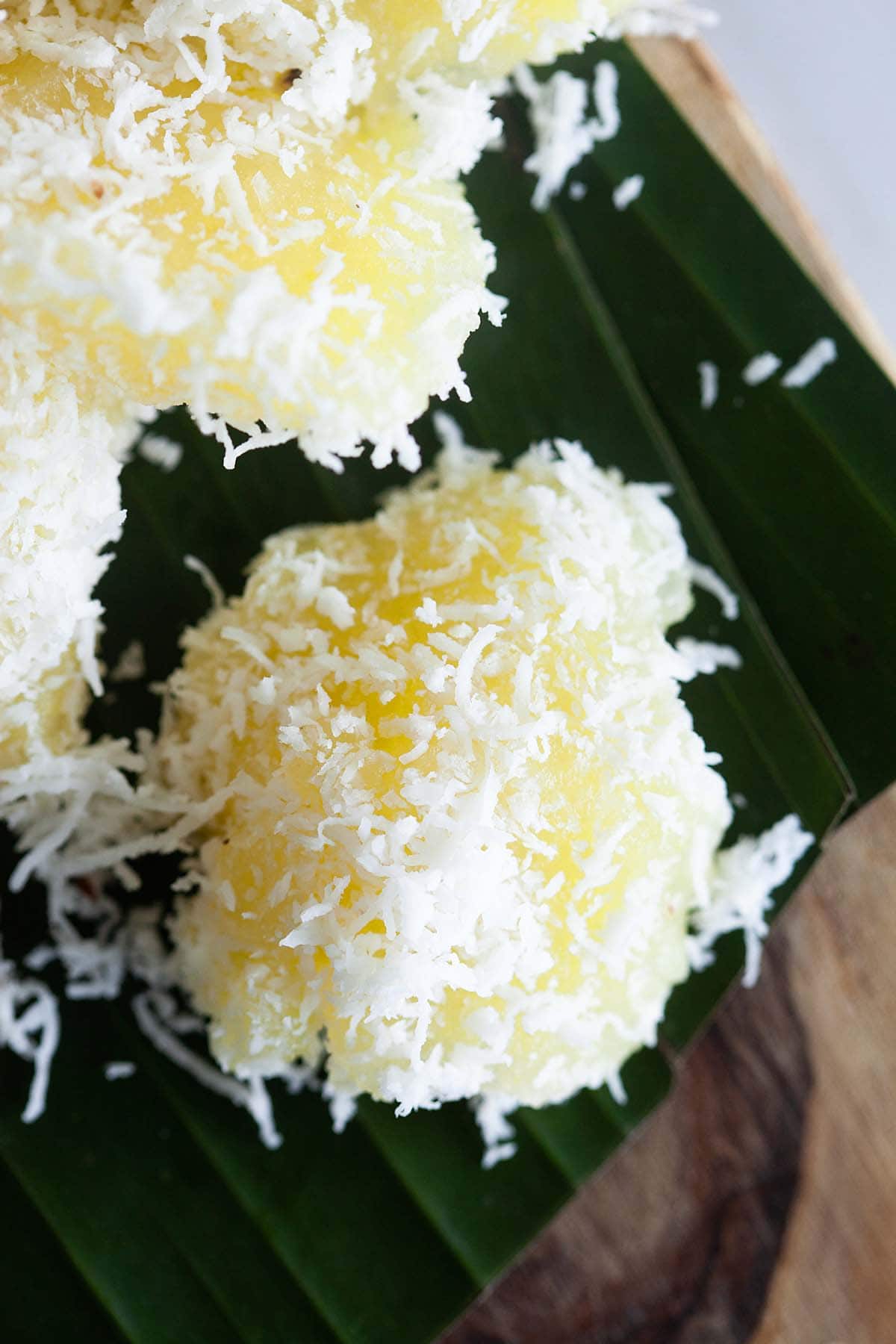 Cassava coated with shredded coconut.