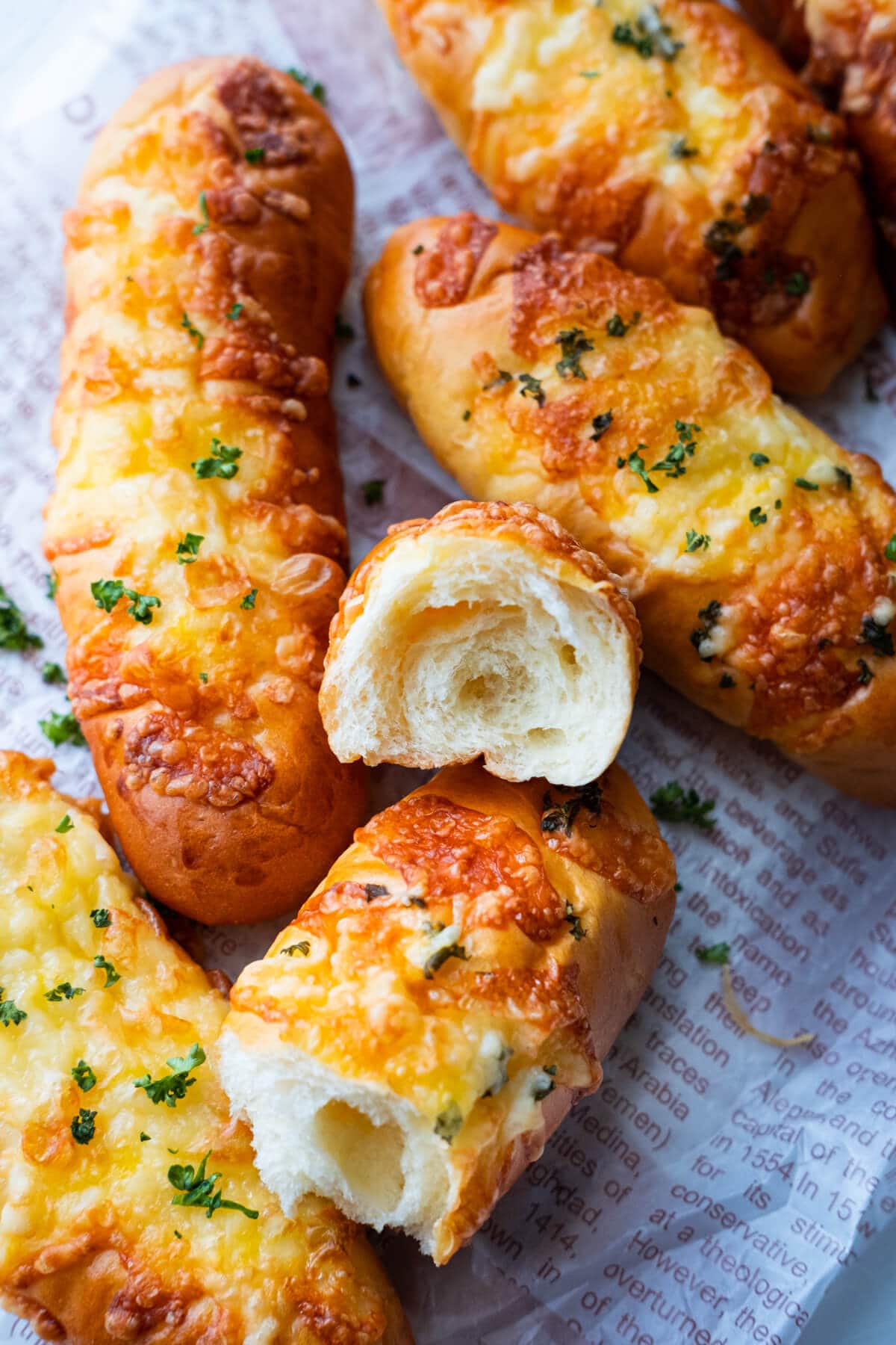 Easy homemade cheese breadsticks, soft and fluffy. 