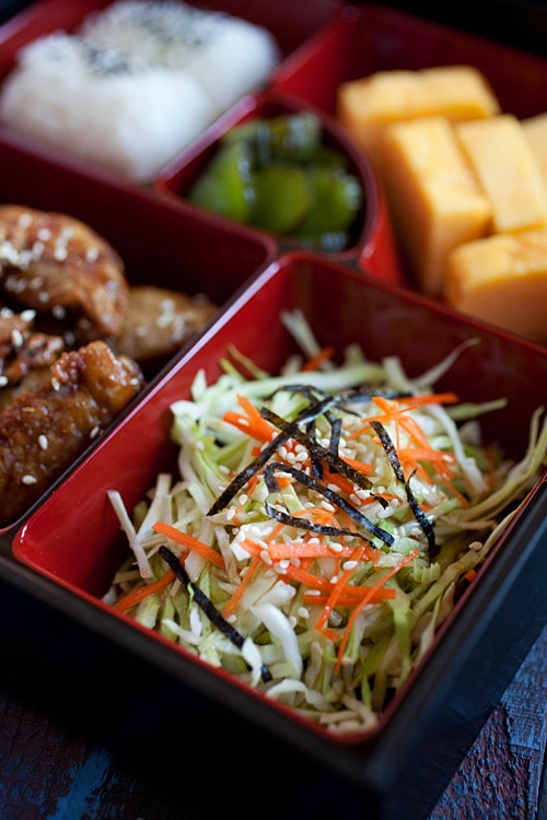 Close up of Japanese salad in a bento box.