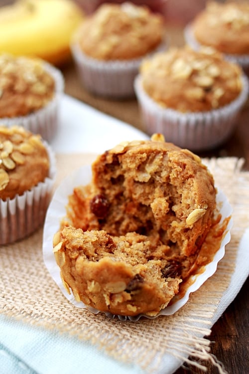 Healthy homemade oatmeal raisin banana muffins in half.