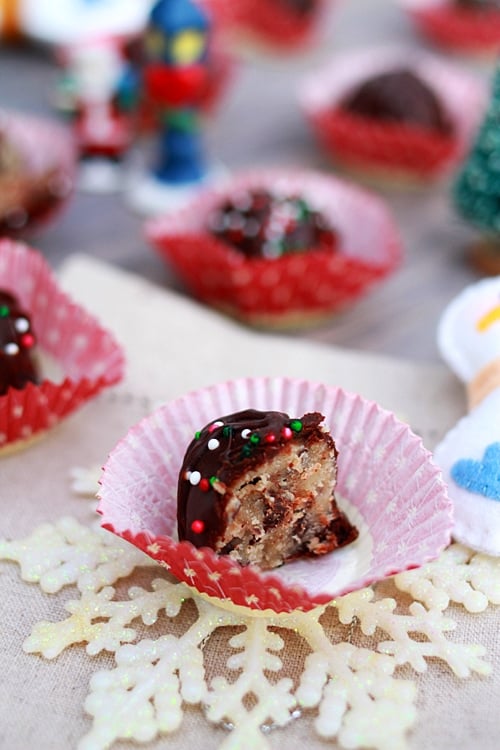 Festive chocolate chip cookie dough truffles in half.