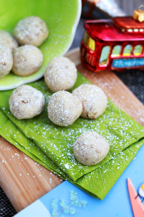 Easy homemade German drop cookies dusted with powdered sugar.