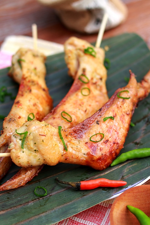 Easy Asian grilled chicken wings marinade with easy Asian spices in skewers.