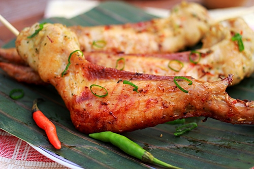 Easy and delicious homemade grilled chicken wings with golden glaze, ready to serve.