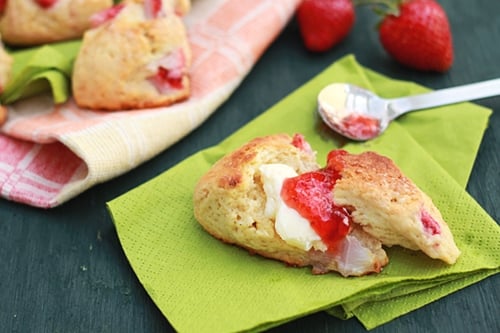 Easy and delicious strawberry scones served with strawberry jam and butter spread, ready to serve.