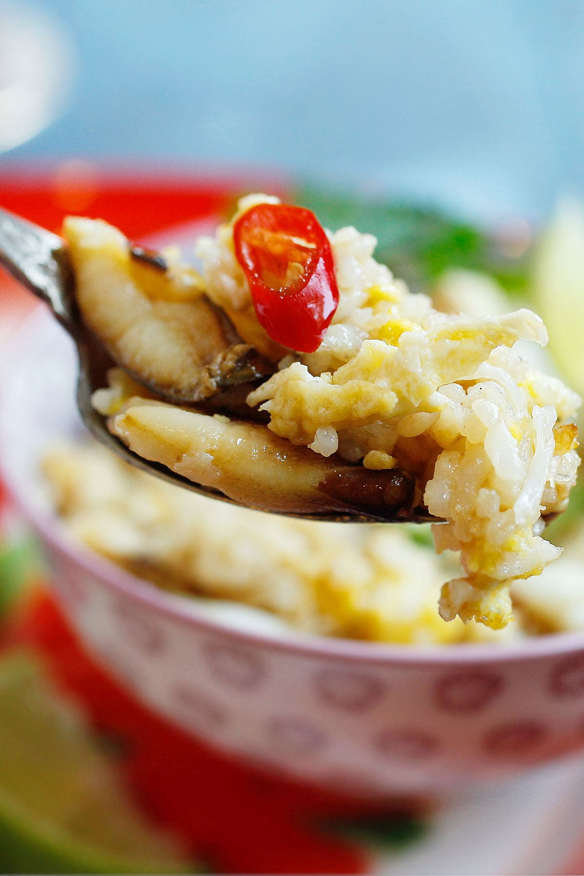 A spoonful of fried rice with crab meat. 