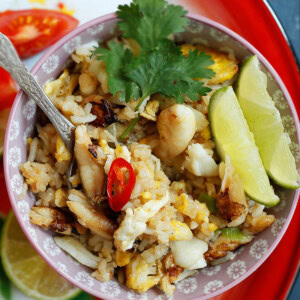 Crab fried rice, Thai style served with chilies and lime wedges.