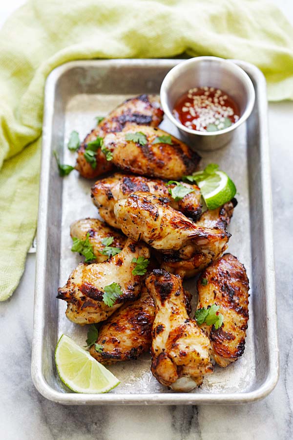 Grilled lemongrass chicken wings in a sheet pan.