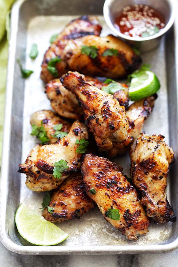 Perfectly grilled lemongrass BBQ wings on a serving platter.