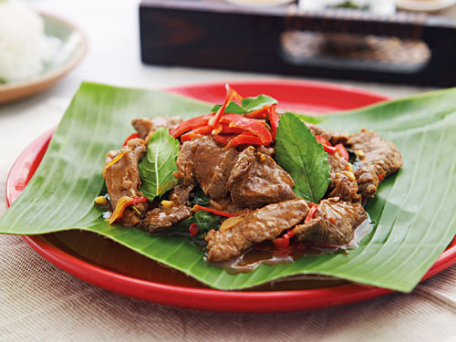 Easy and delicious Thai beef with red chili paste stir fry, served in a plate.