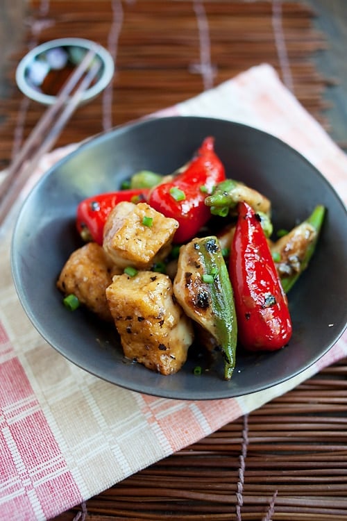 Chinese Hakka tofu fish ball dish stir fry in black bean sauce served in a plate.