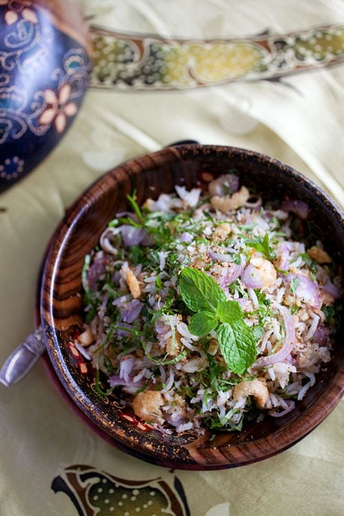 Nasi ulam is a Malay dish. It is utterly delicious, aromatic, healthy, and extremely appetizing, and great with a side dish of meat or fish. What’s more, it can be a complete meal on its own. | rasamalaysia.com