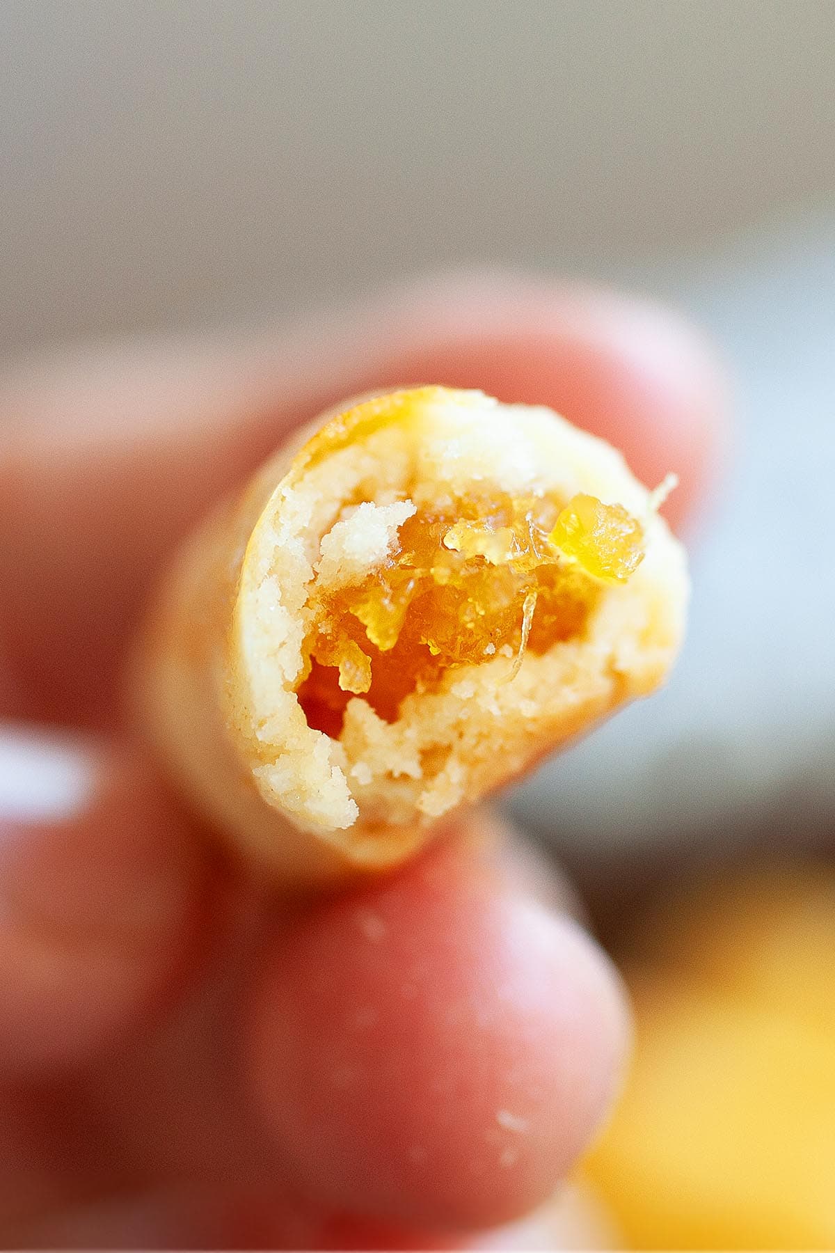 An oval shaped pineapple nastar roll with pineapple jam filling.