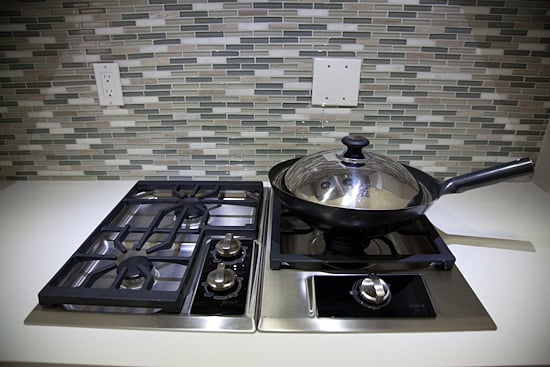 Chinese wok on a stove top in a kitchen. Chinese wok is perfect for stir-frying.