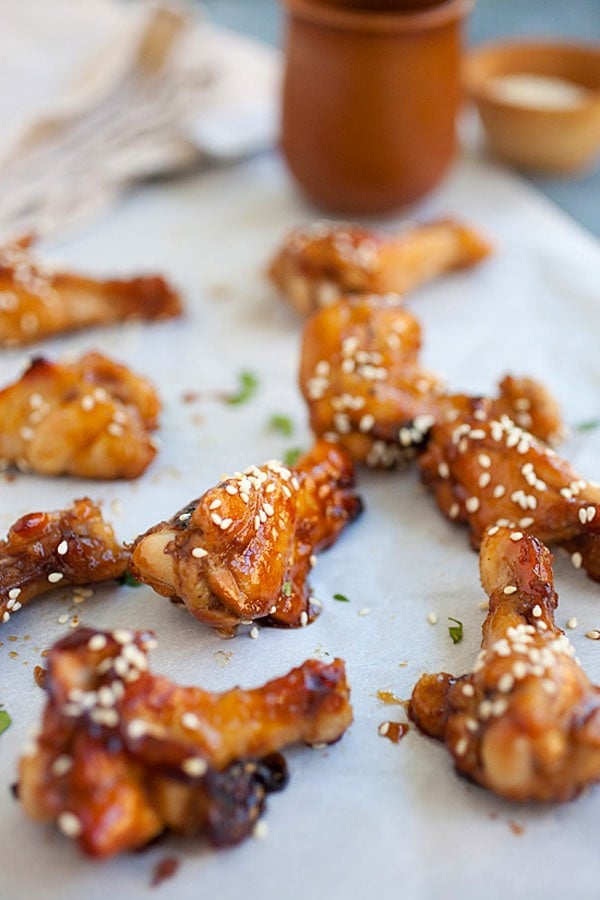 Asian homemade oven baked Honey Soy Chicken Wings on baking sheet.