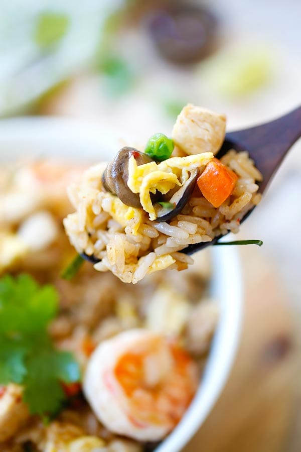 Easy homemade Thai tomyam fried rice on a wooden spoon.