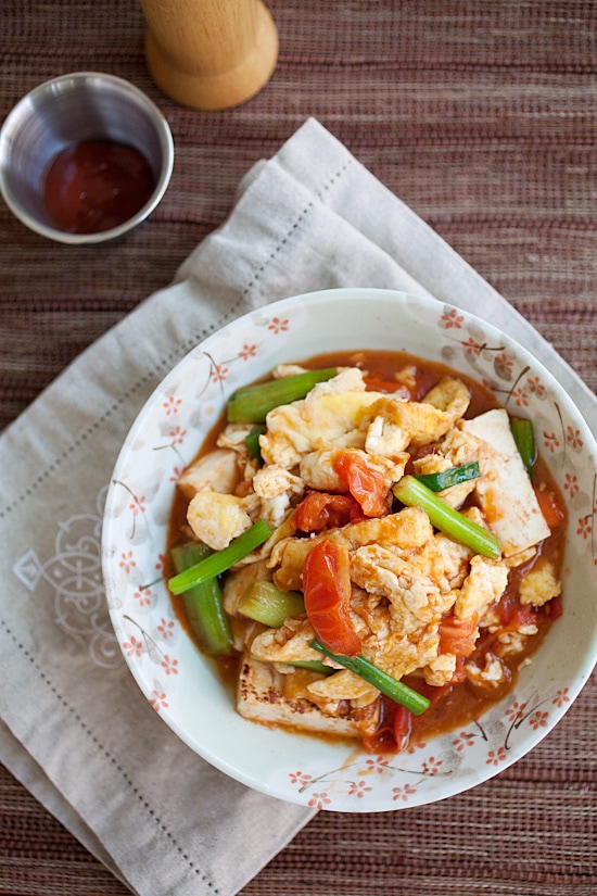 Easy Chinese Tomato and Tofu Eggs serve in a bowl.