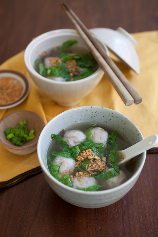 Easy healthy homemade fish balls in bowl of clear soup.