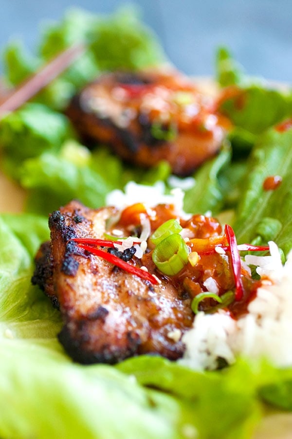 Korean BBQ Chicken (Dak Gogi) served with Korean spicy dipping sauce, rice and lettuce leaves.