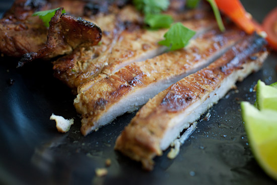 Savory grilled pork chops in a plate ready to serve.