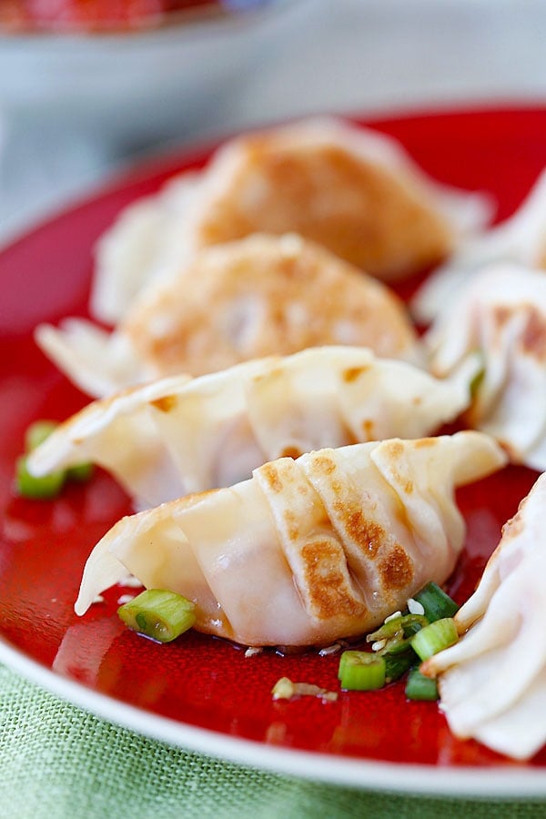 Homemade easy Korean style Kimchi Dumplings in a plate.