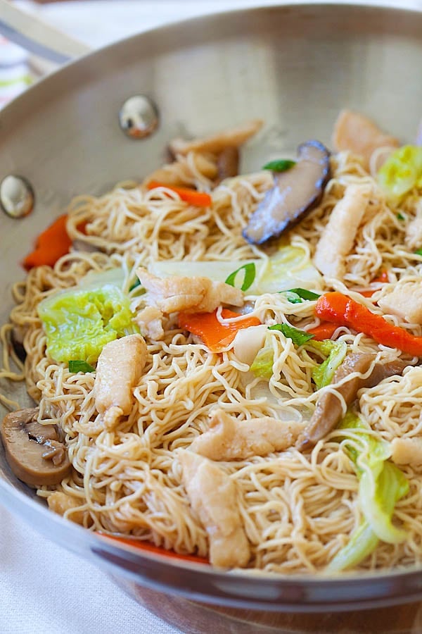 Easy and quick way on how to make chicken lo mein in a wok or skillet at home.