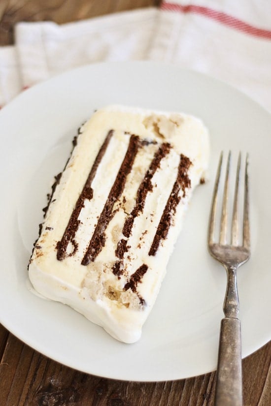 Easy homemade cookie dough ice cream cake serve in a plate with a fork.