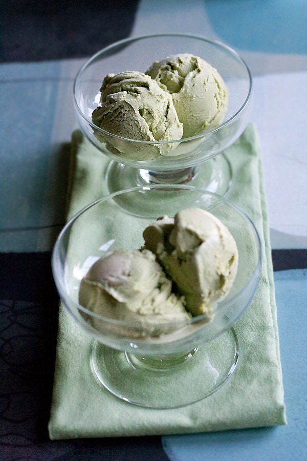 Easy and delicious scoops of homemade Matcha (green tea) ice cream served in dessert bowls.