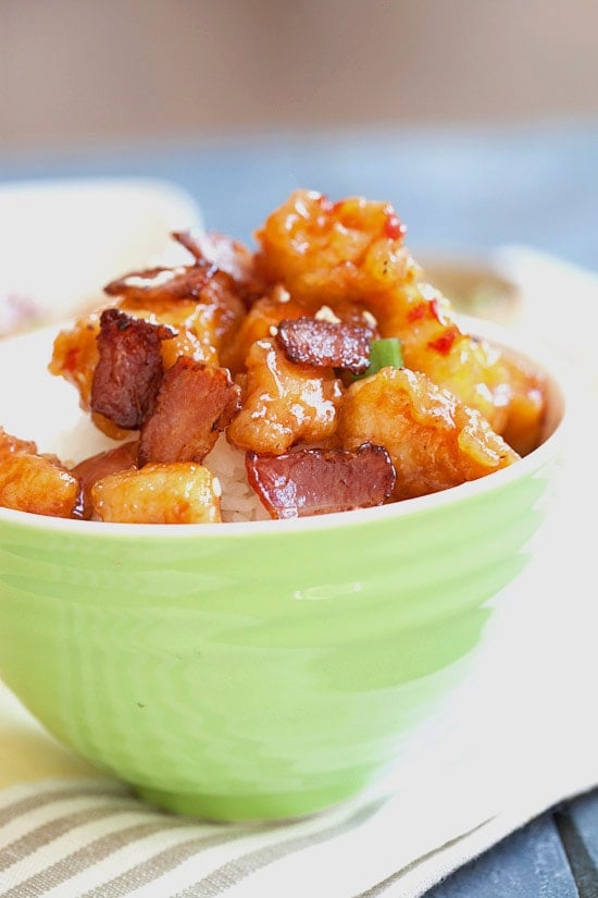 Healthy homemade Panda Express Orange Chicken in a bowl on top of rice.