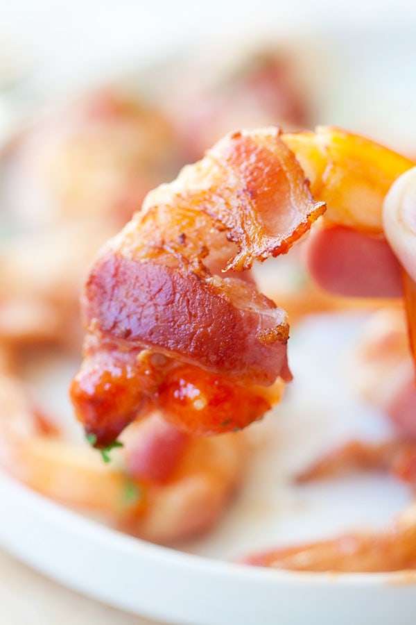 Close up grilled bacon wrapped shrimp.