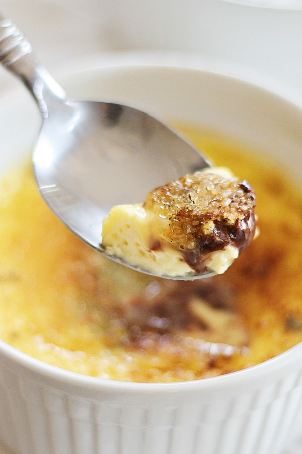 Homemade Nutella Creme Brulee scooped with a spoon.