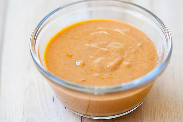 Easy authentic Thai peanut sauce serve in a small bowl.