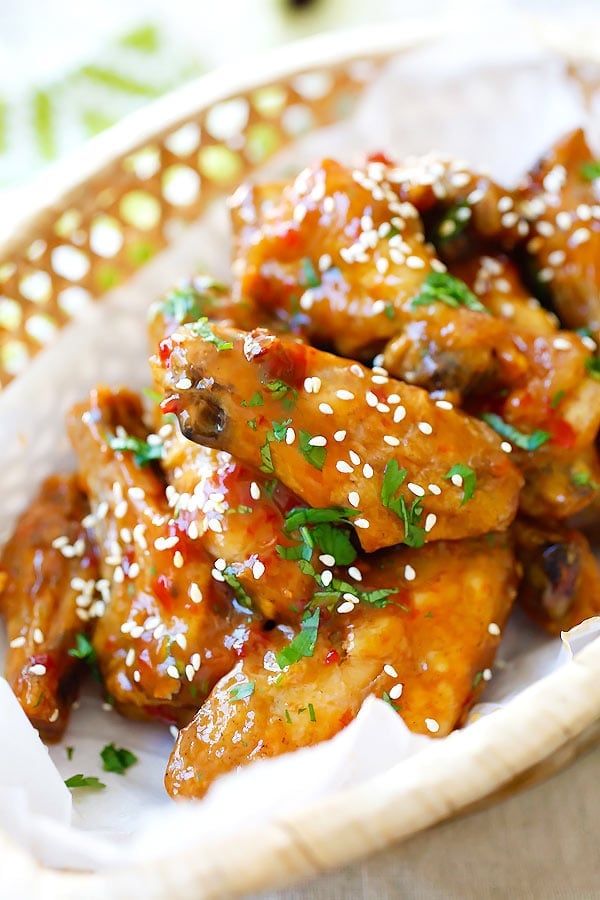 Easy crispy chicken wing picked with fingers.