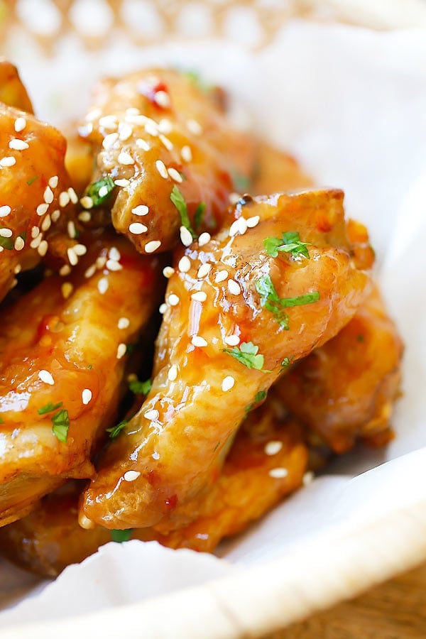 crispy baked chicken wings in wicker serving basket