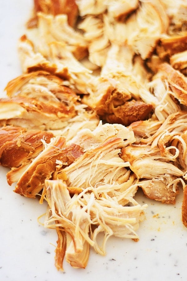 Slow Cooker Honey Teriyaki shredded chicken ready to serve.