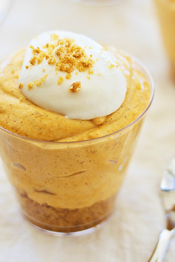 Easy and delicious no-bake pumpkin cheesecake mousse served in glass.