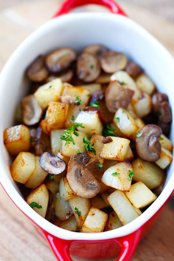 Easy and healthy side dish of potato and mushroom sauteed with butter.