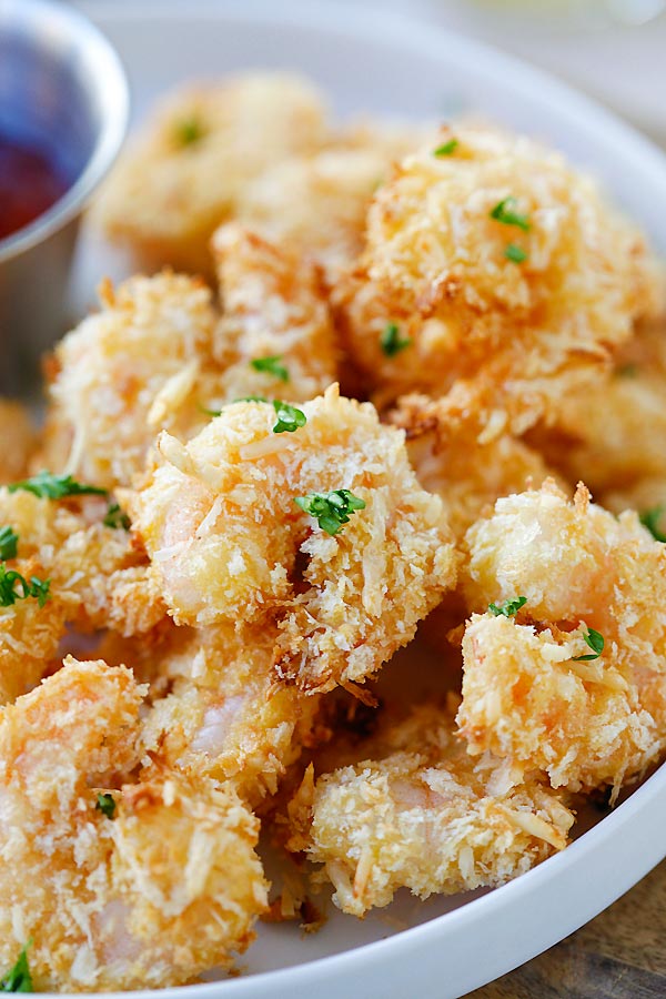 Quick and easy Parmesan Baked Popcorn Shrimp snacks ready to serve.