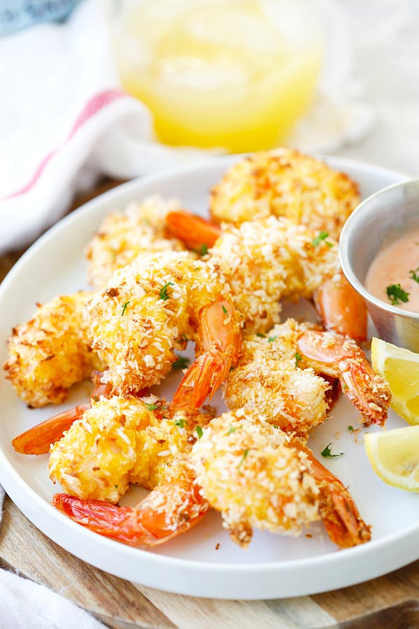 Easy crispy oven baked coconut shrimp ready to serve.